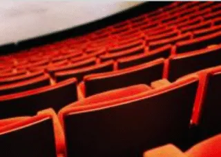 image of red seats in theatre